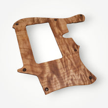 Exotic wood pickguard and cavity cover set.