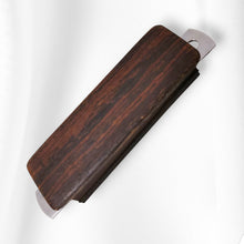 Custom wood string mute for arch top type bridge.
