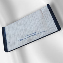 Custom bridged thumb-ramp. Exotic wood